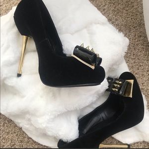 Black and gold heels
